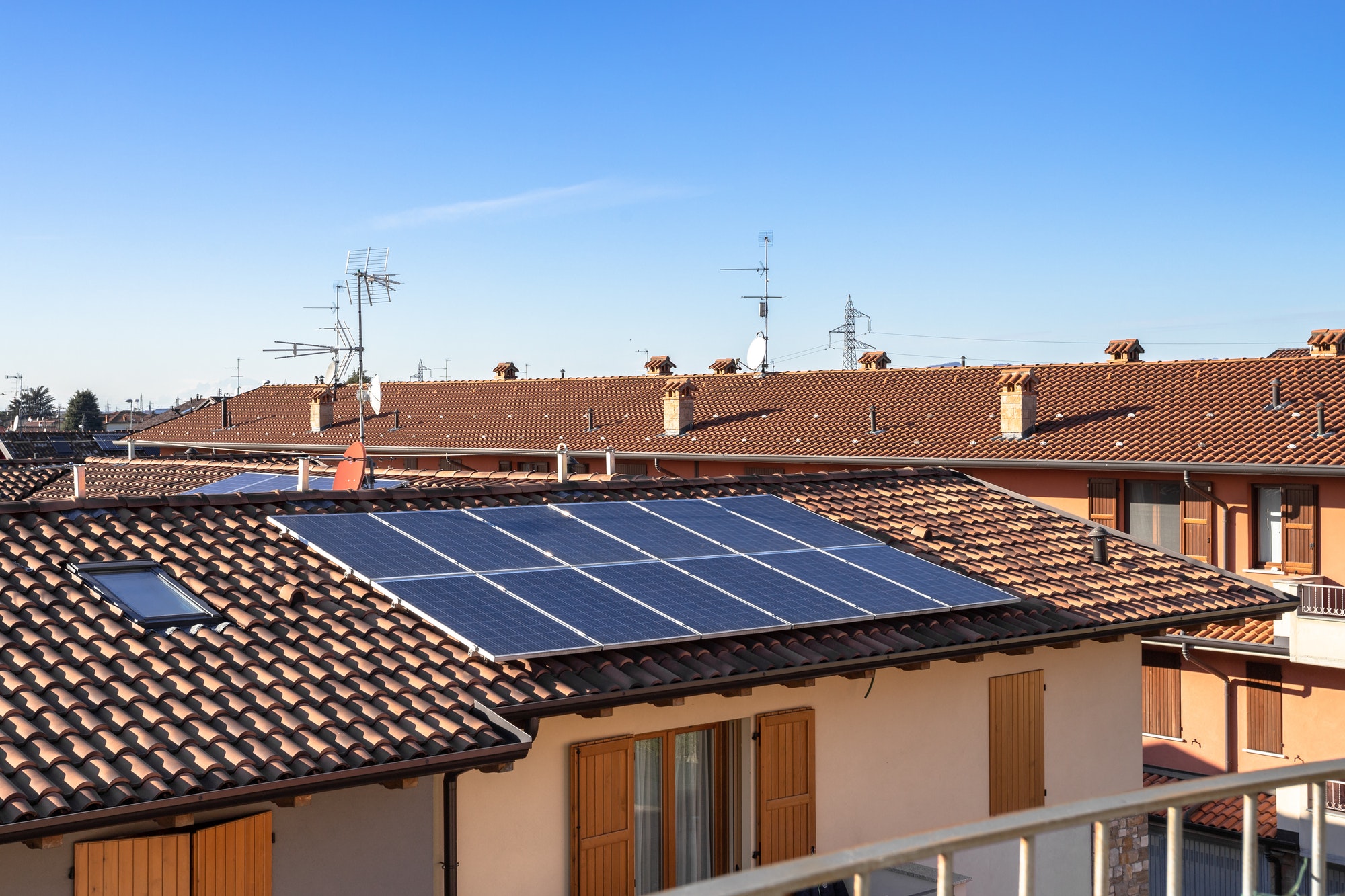 Solar panel on a red roof